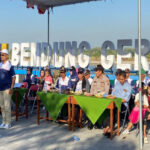 Danramil 0817/15 Bungah, Kapten Kav Triyono, menghadiri acara lomba gerak jalan tradisional di lapangan Bendung Gerak Sembayat (BGS) Desa Sidomukti, Kecamatan Bungah, Gresik.