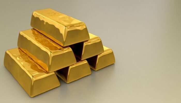 Harga Emas Melonjak ke Rekor Tertinggi, Dolar AS Tertekan